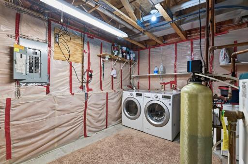 Large lower level utility room with utility sink