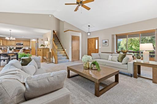 The open floor plan offers an easy flow between living, dining, and gathering spaces.
