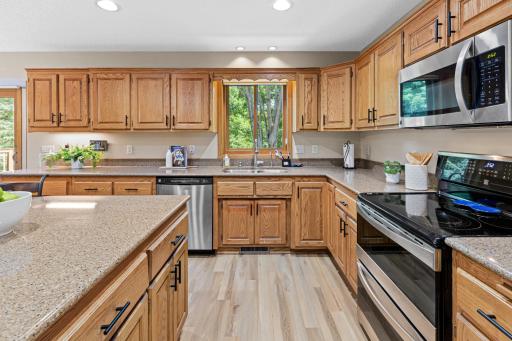 Designed with everything within easy reach and a window overlooking the backyard.