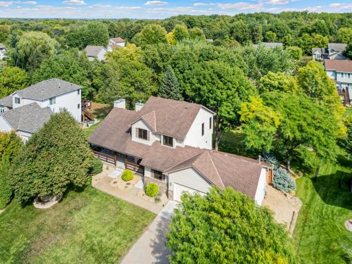 Surrounded by mature trees, with plenty of space to enjoy life outdoors.