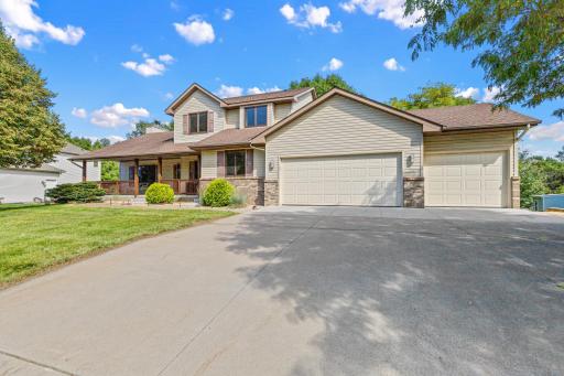The heated 3-car garage offers plenty of room for vehicles, storage, hobbies, and more.