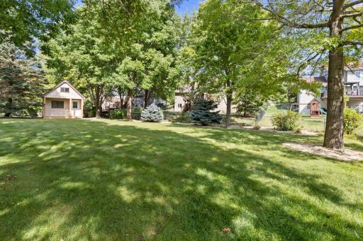 A generous lawn leaves plenty of room for play, pets, and afternoons outside.