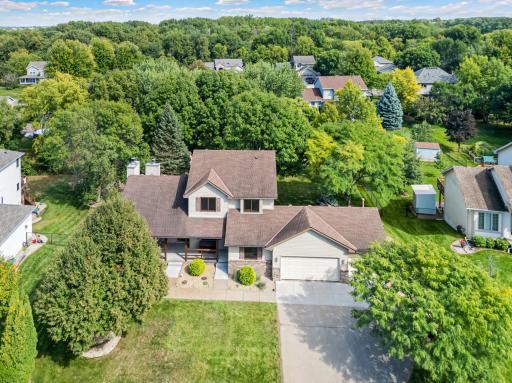 Classic curb appeal, a welcoming front porch, and a spacious 3-car garage.