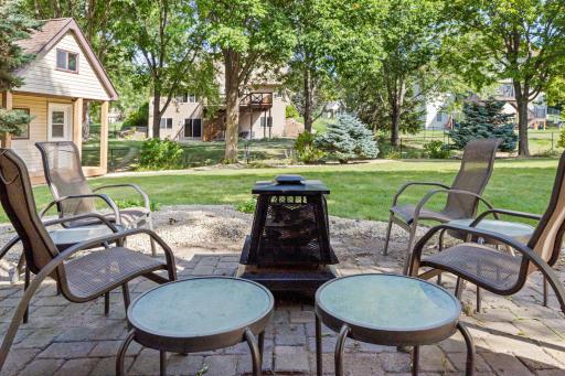 Step outside to a patio ready for evenings around the fire.