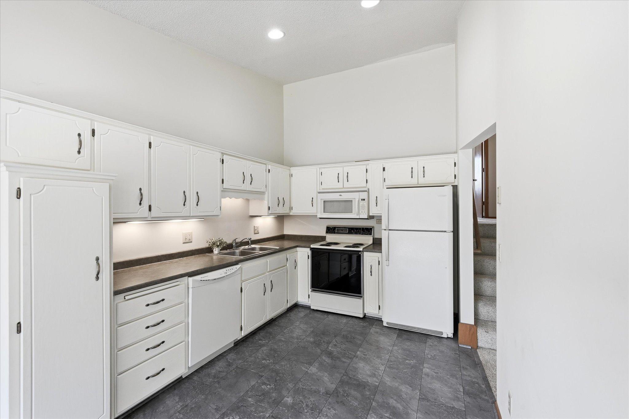 New vinyl flooring, kitchen sink and garbage disposal: 2022
