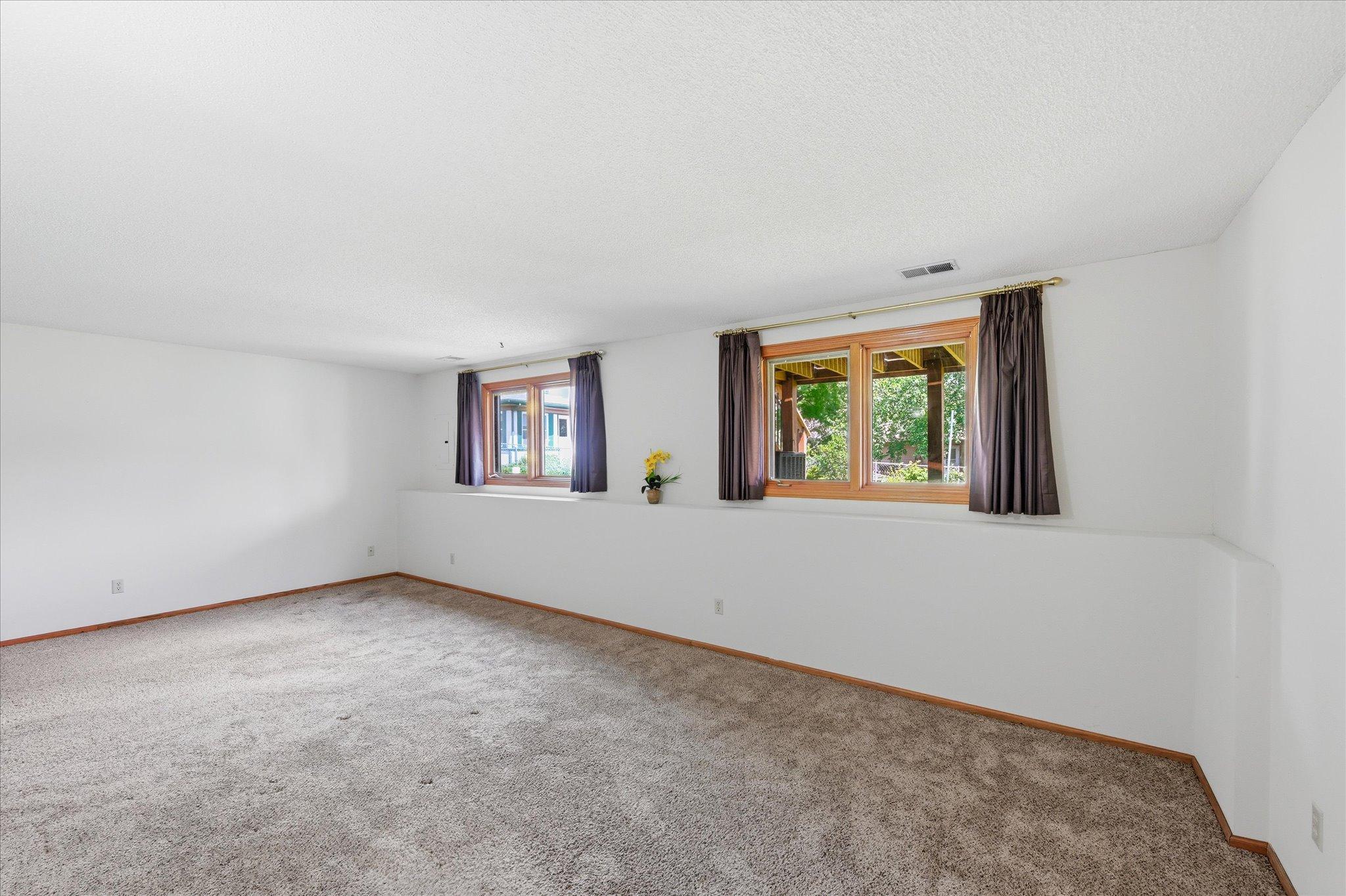 A spacious family room provides additional flexibility for entertainment, hobbies, or everyday use.