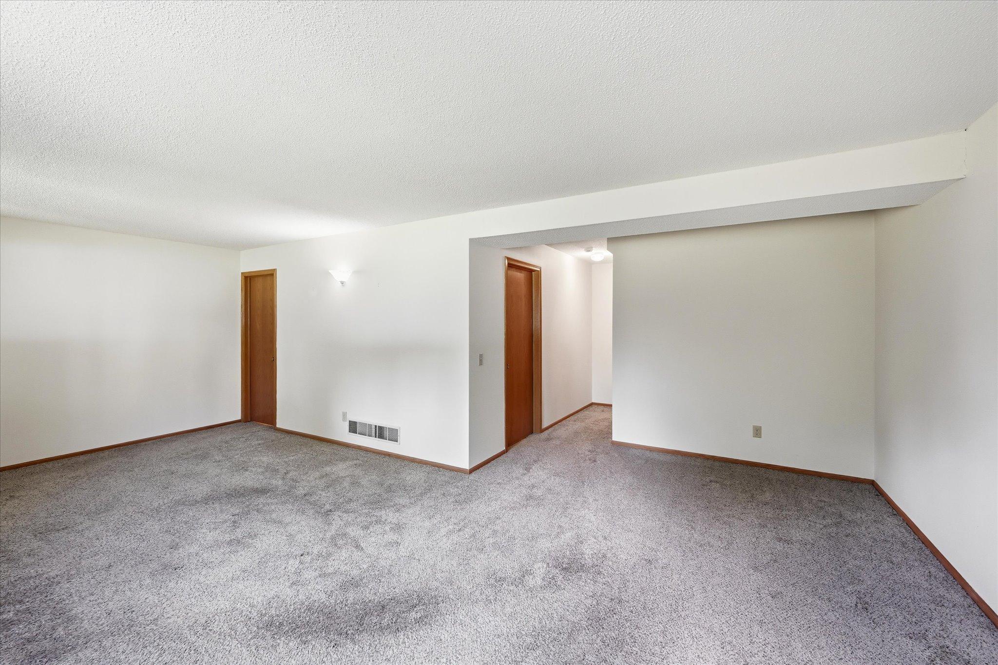 Functional storage solutions can be found throughout the home, including dedicated storage beneath the entryway.