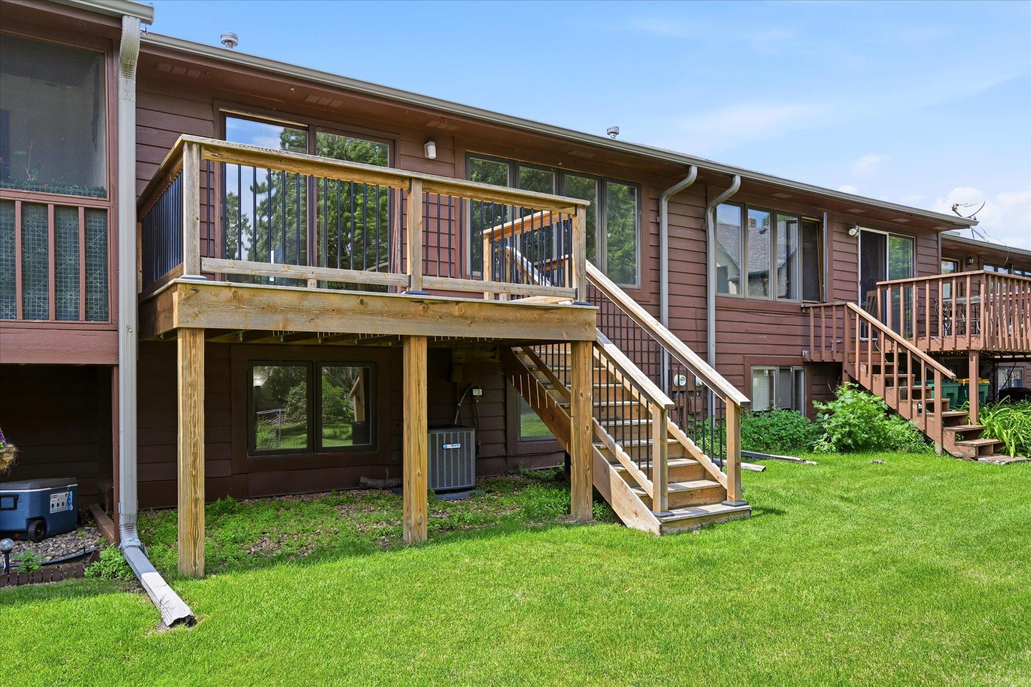 The elevated deck creates an ideal spot to take in the surrounding greenery throughout the seasons.