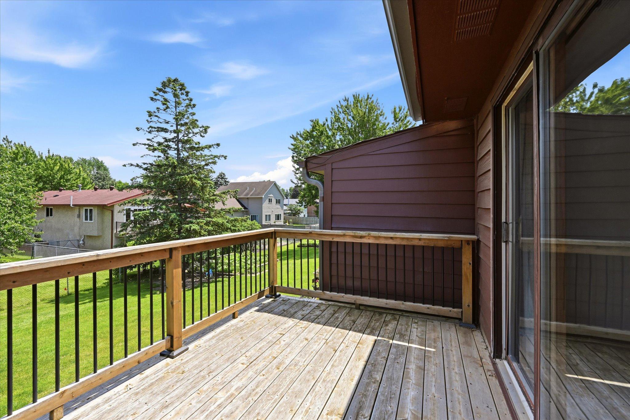 The deck provides a seamless extension of the living space, perfect for dining, gathering, or simply unwinding.