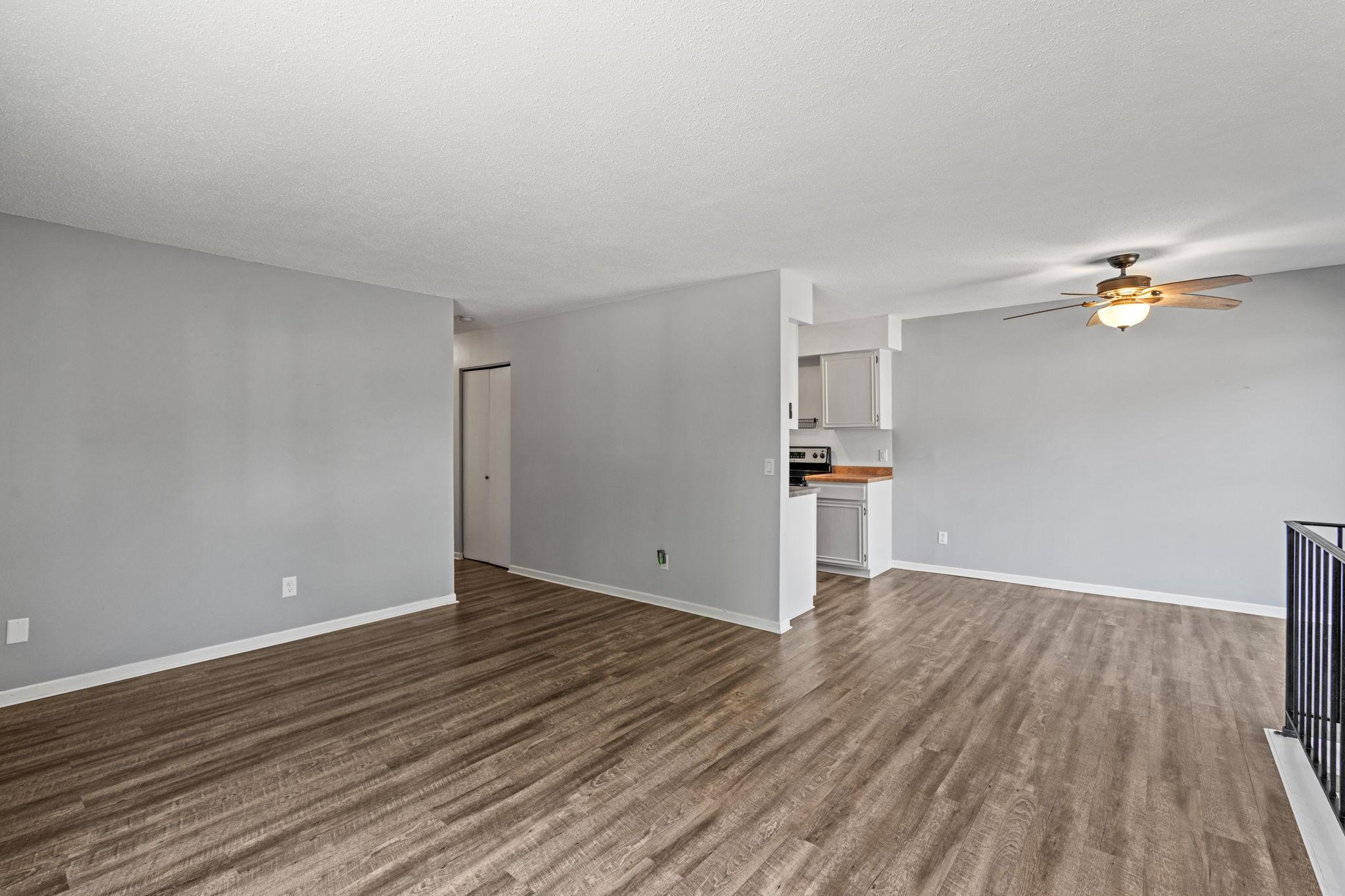 Spacious living room that flows into the informal dining space