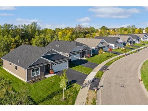 Welcome to Education Drive! Several homesites to build on or move-in ready 2 and 3 bedroom villas with 2 or 3 car garages!