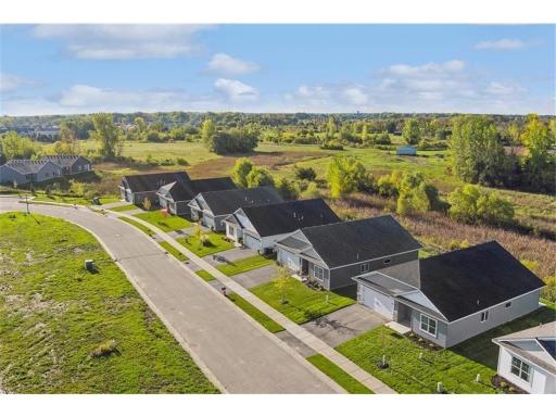 Welcome to Education Drive! Several homesites to build on or move-in ready 2 and 3 bedroom villas with 2 or 3 car garages!