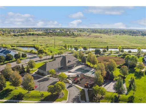 Enjoy a beautiful walk from your new home to the remodeled Waters Edge Community Center: includes a pool and lounging areas, gym, game rooms with pool table, reservable party/banquet room with full kitchen, and stunning lobby area with fireplace.