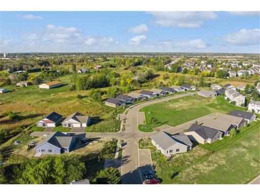 Welcome to Education Drive! Several homesites to build on or move-in ready 2 and 3 bedroom villas with 2 or 3 car garages!