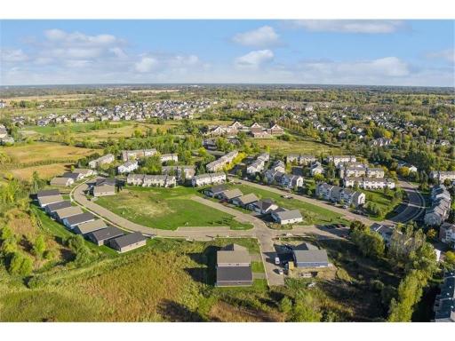 Welcome to Education Drive! Several homesites to build on or move-in ready 2 and 3 bedroom villas with 2 or 3 car garages!