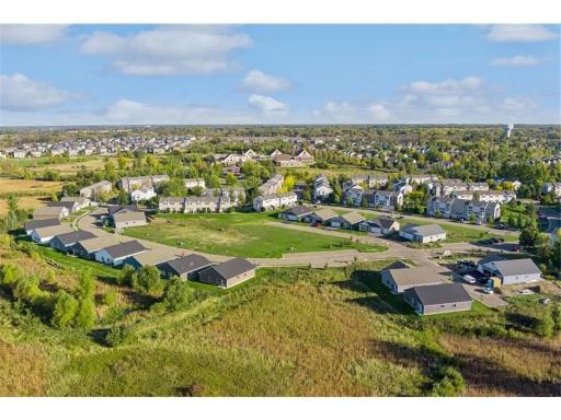 Welcome to Education Drive! Several homesites to build on or move-in ready 2 and 3 bedroom villas with 2 or 3 car garages!