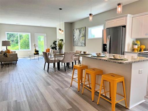 Open Design - stunning kitchen with stainless steel appliances, quarts center island, walk-in pantry and more!