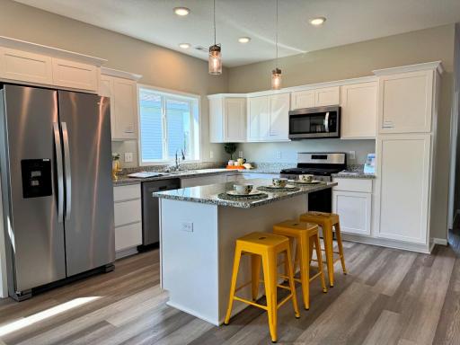 Open Design - stunning kitchen with stainless steel appliances, quarts center island, walk-in pantry and more!