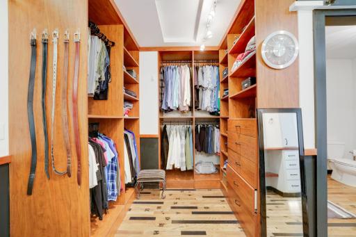 Primary closet off of the bathroom