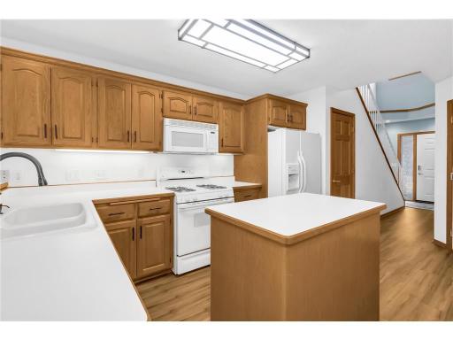 Kitchen with updated hardware and faucets