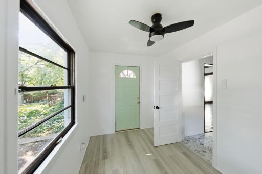 Third bedroom, playroom, office...you decide! Shares exit to back yard OR has it's own entrance!
