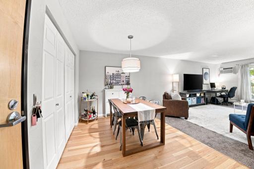 Dedicated dining area situated conveniently between the kitchen and living spaces.
