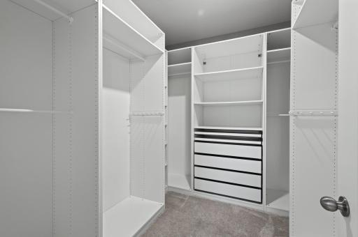 Primary closet with custom built ins