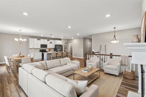 Virtually staged main level entertaining area