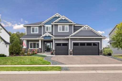 A ground-level view of this beautiful 2021-built home and its attractive exterior.