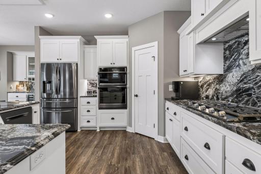 So much space to enjoy! Beautiful finishes and a warm, timeless color palette make this kitchen stand out.