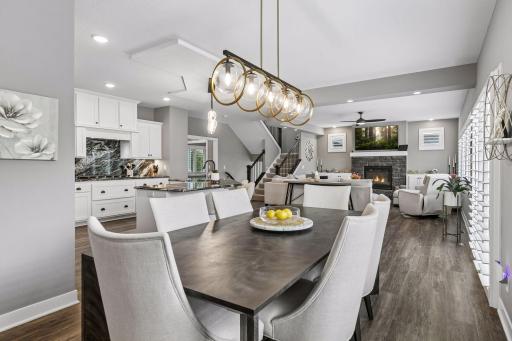 From the dining area, enjoy an open view into both the kitchen and living room, creating wonderful flow throughout the main level.
