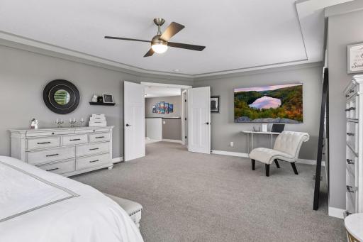 French doors welcome you into the impressive primary suite and add an extra touch of elegance.