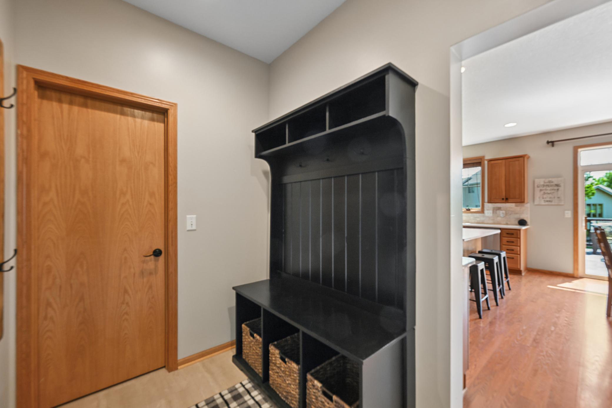 Mudroom has plenty of storage plus a closet