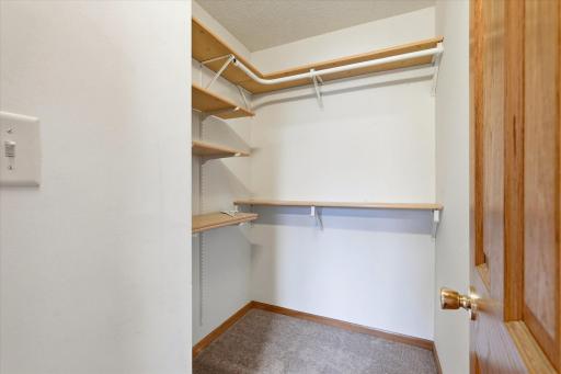 One of the two upper level bedrooms features a walk-in closet.