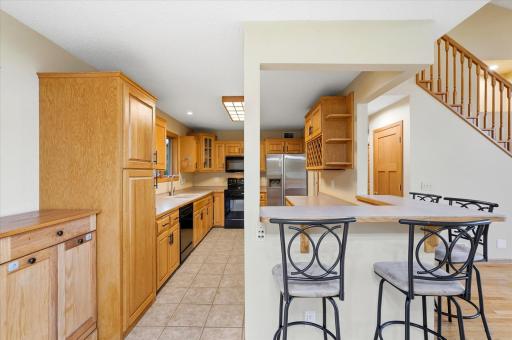 The kitchen offers tons of cabinet space