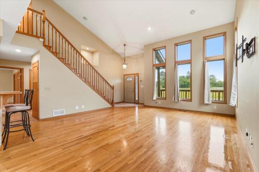 gleaming hardwood floors span the main level