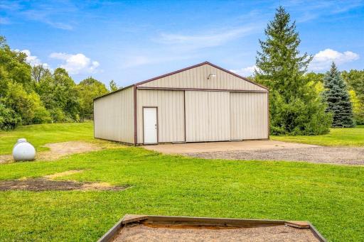 The 30x40 pole shed has a concrete floor-great storage for all of the toys!
