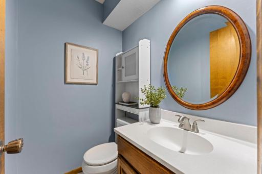 The guest bathroom on the main level is clean and ready to host.