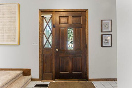 The large entryway greets guests with plenty of space and an inviting introduction to the home.