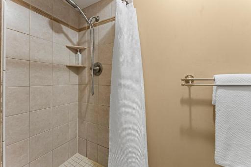 The primary has it's own tiled shower and toilet.