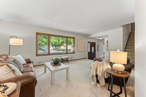 Each room features large windows allowing for an abundance of natural sunlight to flow through this home.