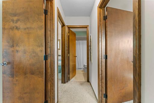 Heading upstairs, you will find 3 bedrooms and two bathrooms along with the natural woodwork matching the main level.