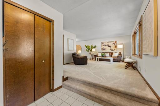 Step into the living room and feel the brand new plush carpet underneath your feet.
