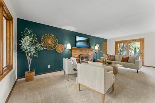 No need to head to another level for extra living space! This expansive main-level family room offers the perfect place to gather, entertain guests, or simply relax and enjoy time together.