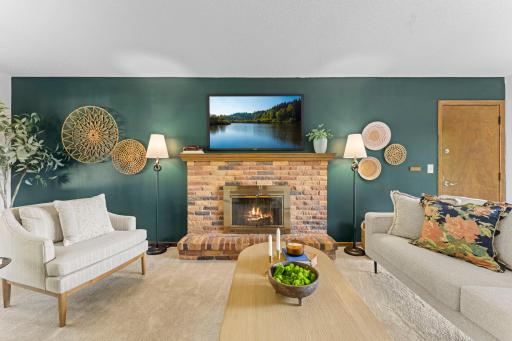 The wood fireplace is waiting to be used during the long winters.