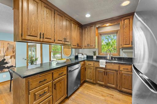 The kitchen looks right into the informal dining room space.