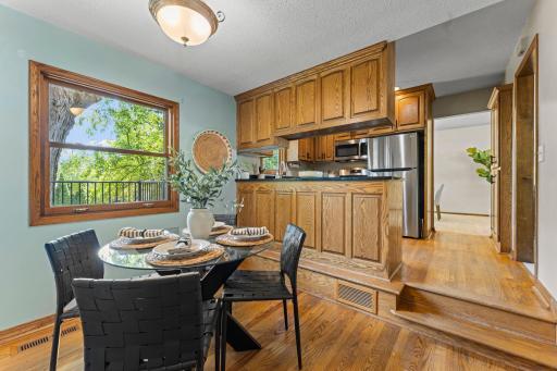 Enjoy morning coffee or tea in the charming informal dining room.