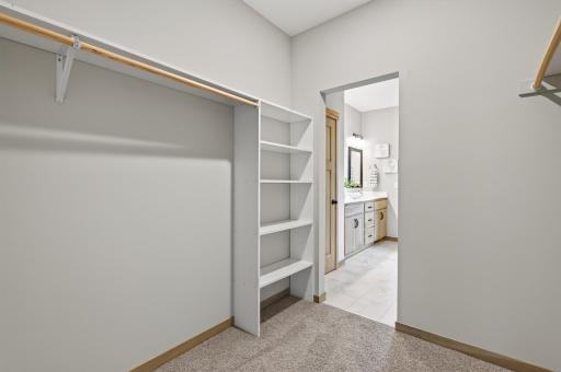 The builder adds in a nice shelf that works for shoes or folded clothes.