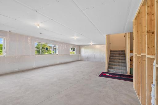 Another view of the daylight lite basement and the finished stairways.
