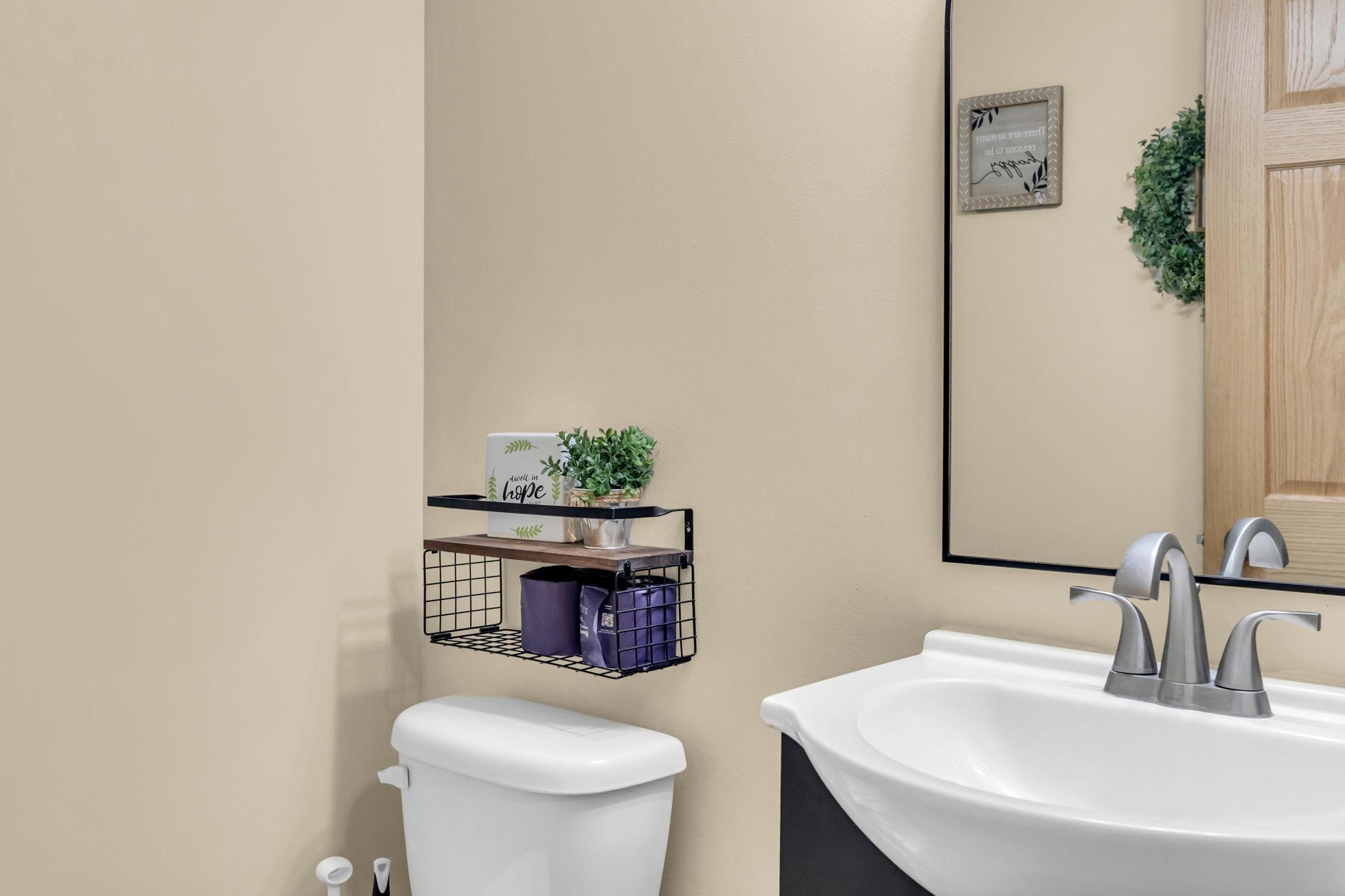 Main level half bath/powder room